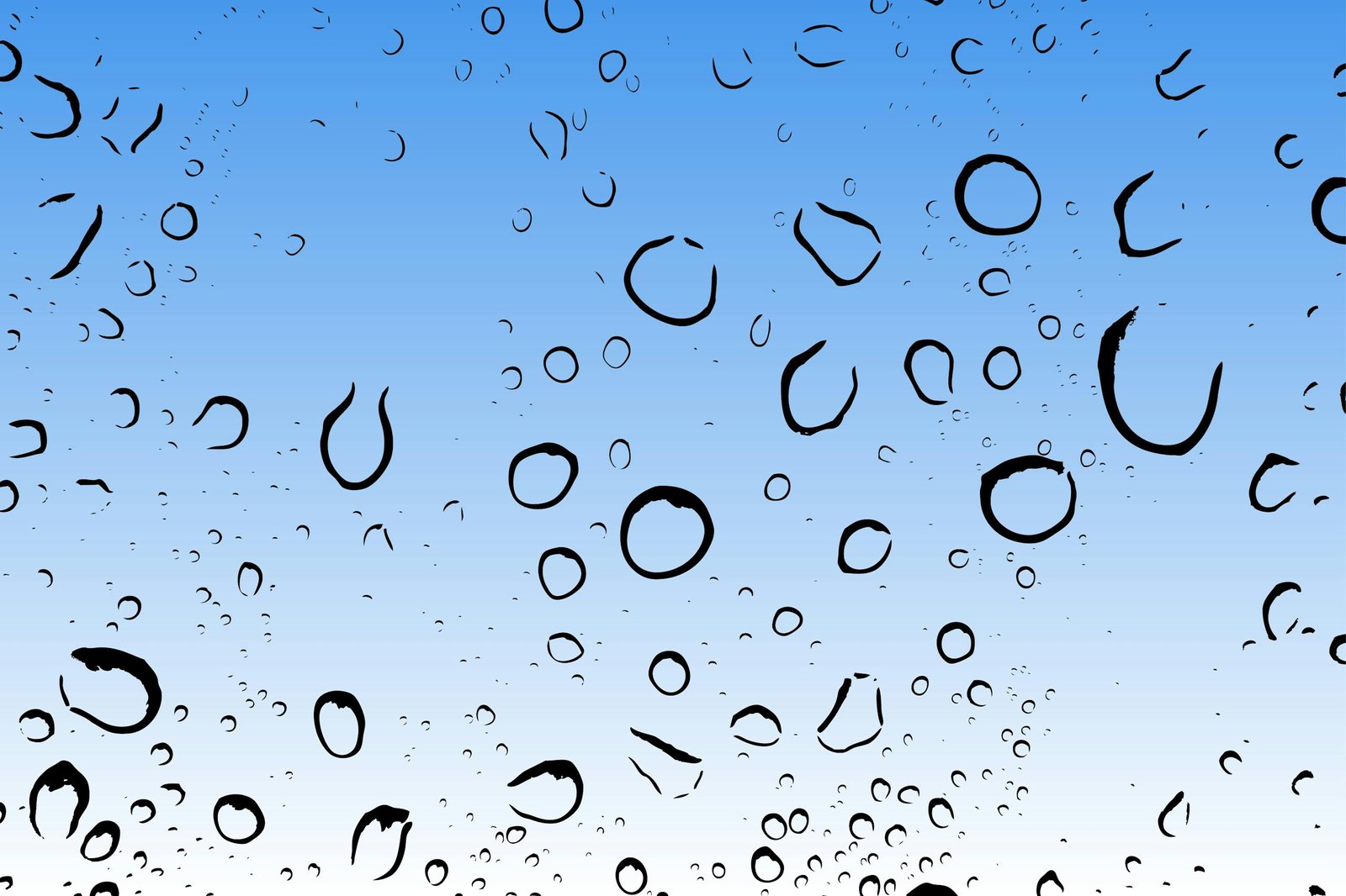 Water droplets on glass against a blue sky, creating a refreshing and clear scene.